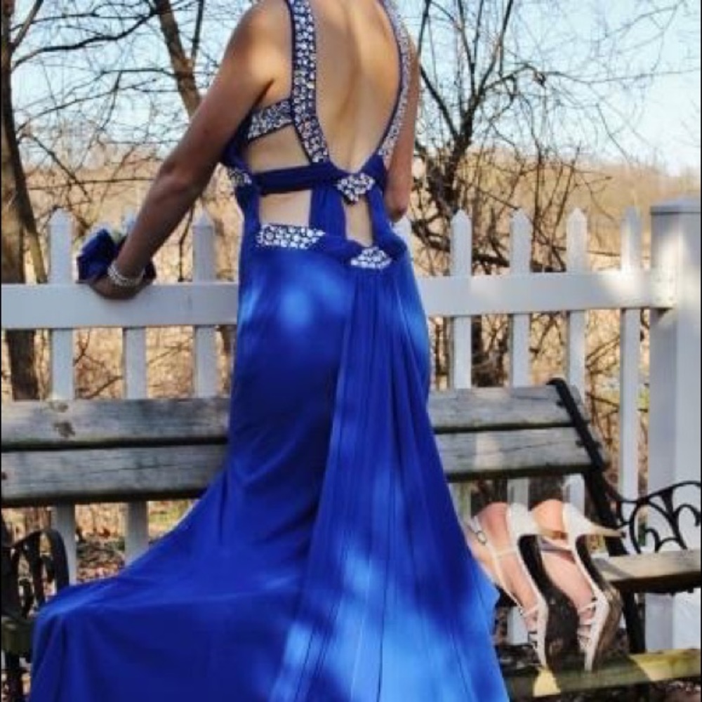 Stunning, open backed formal dress